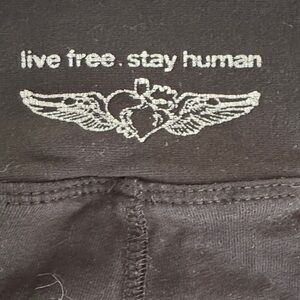 Black low rise Capri leggings with ruffle bottoms